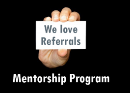 Hand holding card saying "We love referrals" with text "Mentorship Program" below it